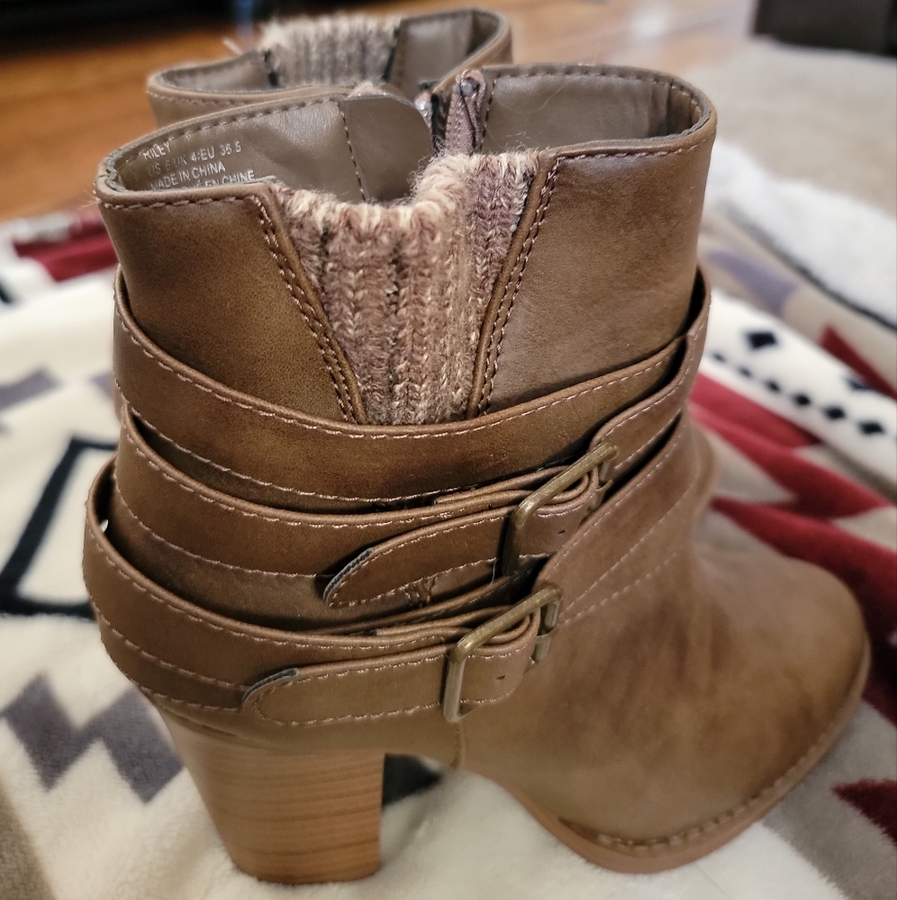 Wrapped around buckle booties